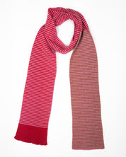 Red, pink and brown striped scarf on a white background.