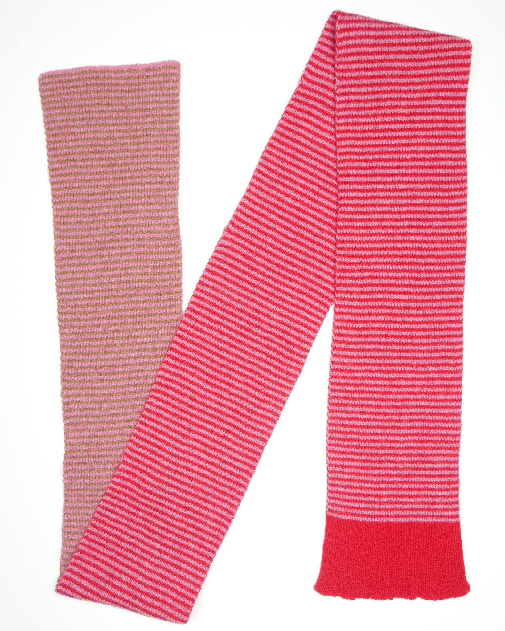 Red, pink and brown striped scarf on a white background.