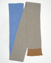 A blue and brown striped scarf on a white backgound