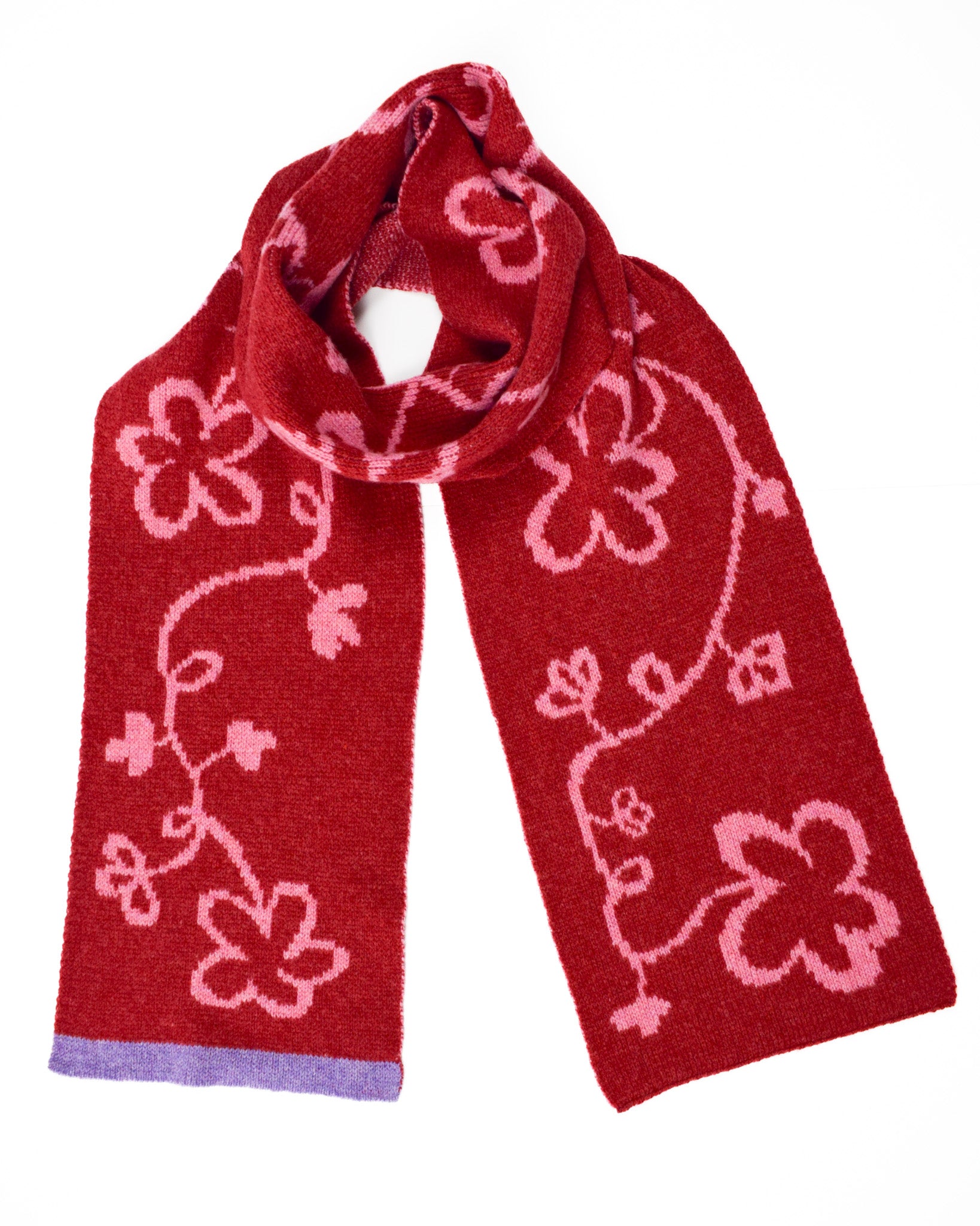 Red scarf with pink floral patterns on a white background