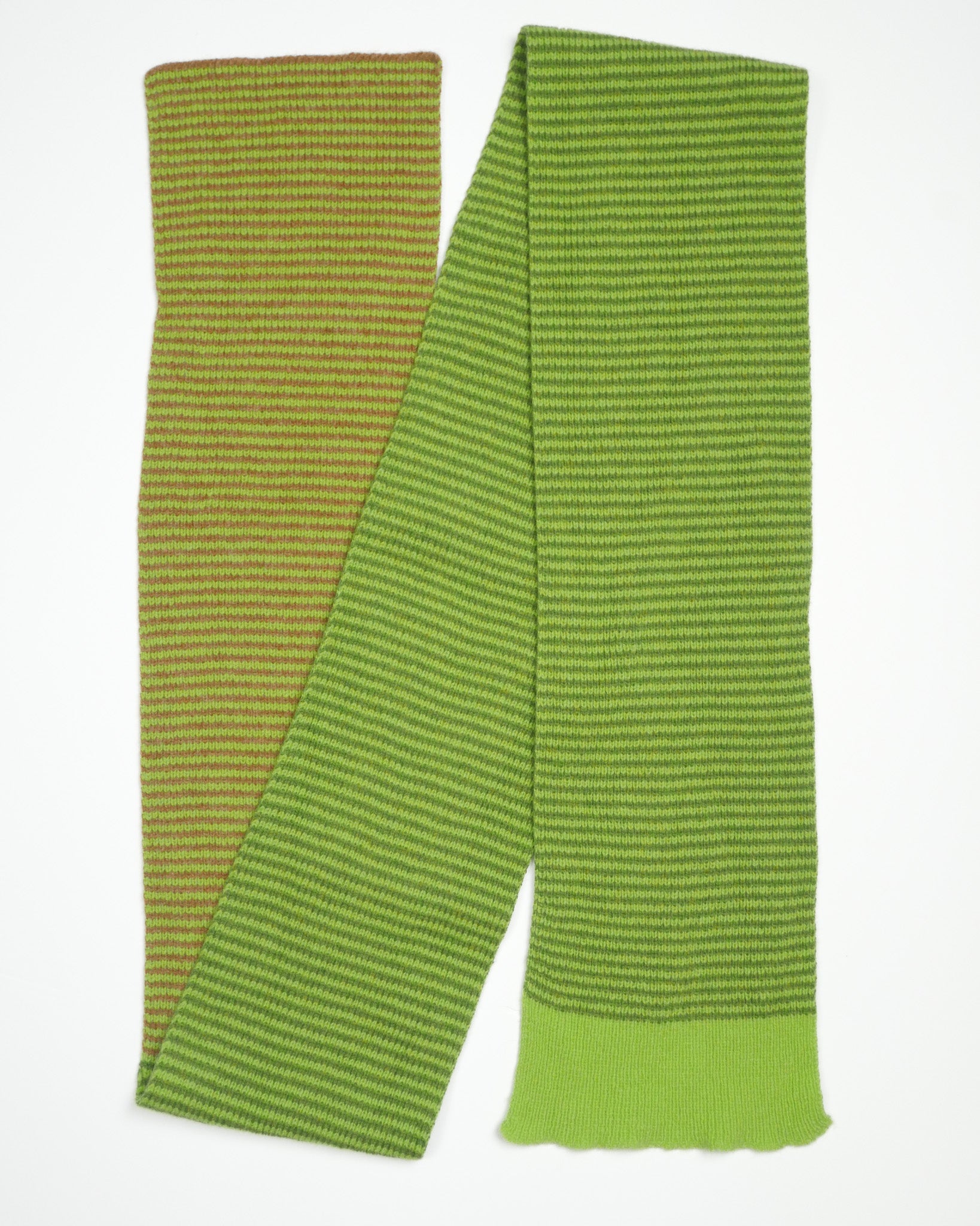 Green striped scarf on white background